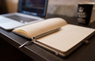 laptop and book